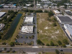 Drone aerial view for Land Mapping of adjoining commercial parcels, shared access roads, parking, and drainage in St. Petersburg, Florida.